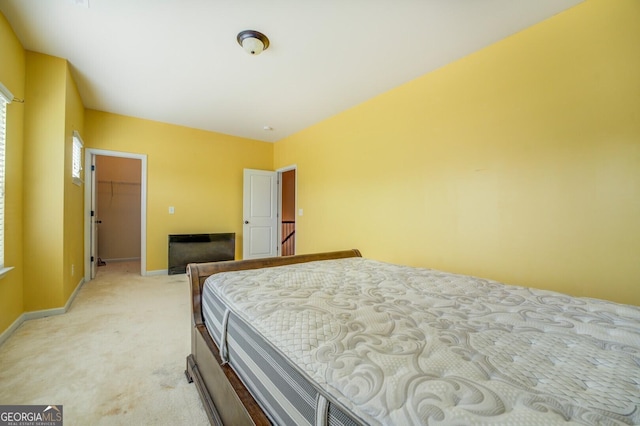 445 Brickstone Way, Covington, GA 30016 - bedroom with light carpet and a spacious closet