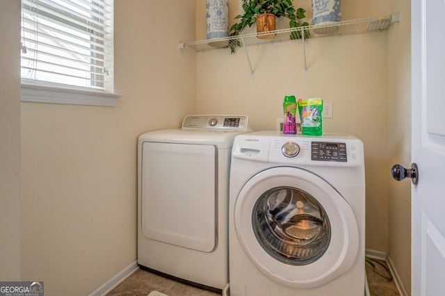 445 Brickstone Way, Covington, GA 30016 - washroom with washing machine and clothes dryer and baseboards