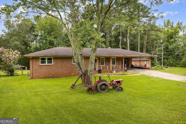 ranch-style home with a porch and a front lawn