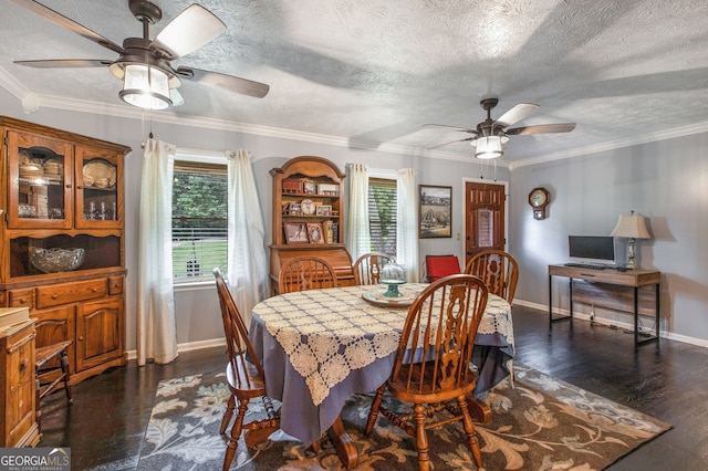 dining space featuring dark wood-type flooring, a textured ceiling, and ceiling fan