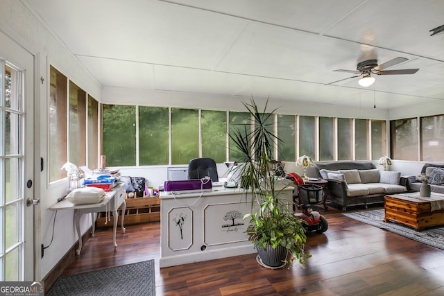 sunroom featuring plenty of natural light and ceiling fan