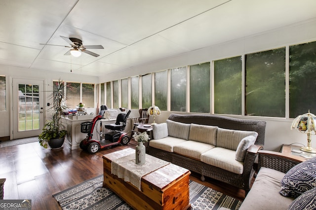 sunroom / solarium with ceiling fan