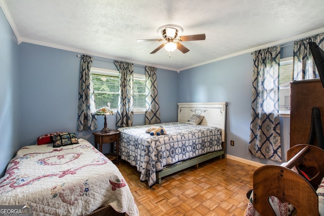 bedroom with ornamental molding, light parquet floors, a textured ceiling, and ceiling fan