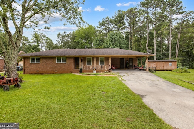 ranch-style house with a front lawn, crawl space, brick siding, and concrete driveway