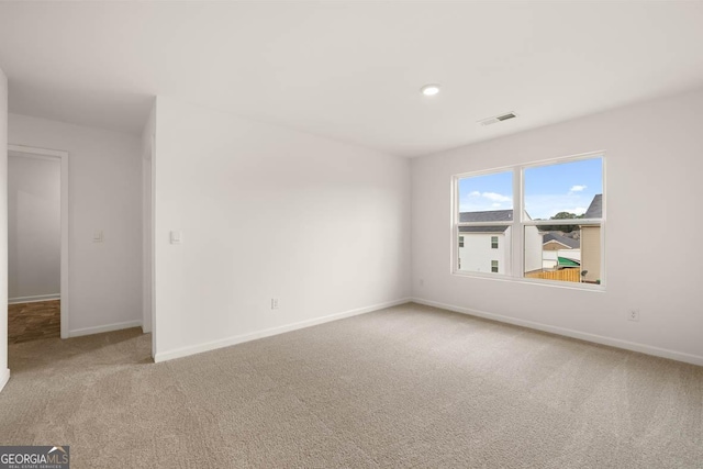 view of carpeted spare room