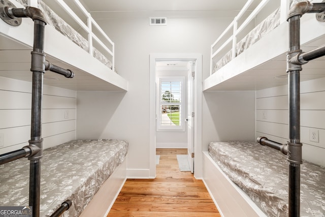 bedroom with light hardwood / wood-style floors