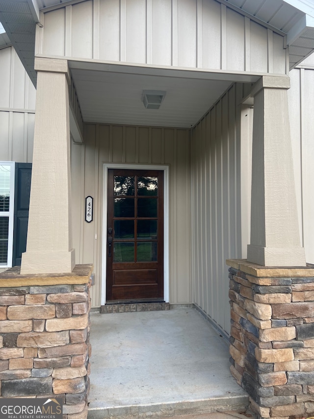 property entrance with a porch