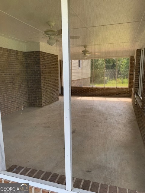 view of patio featuring ceiling fan