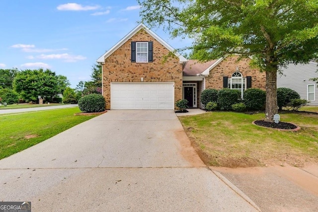 traditional-style home featuring an attached garage, a front lawn, concrete driveway, and brick siding