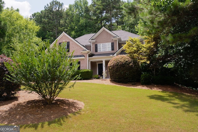 view of front facade with a front lawn