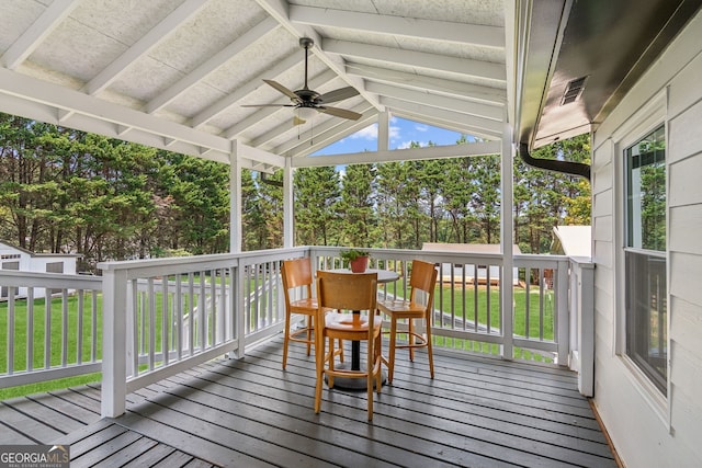 wooden deck with ceiling fan