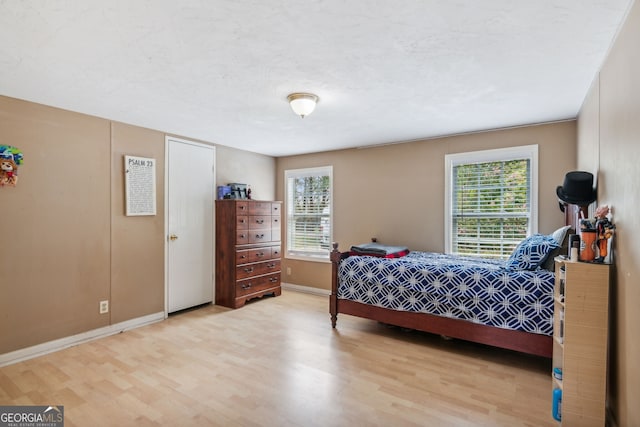 bedroom featuring light hardwood / wood-style floors