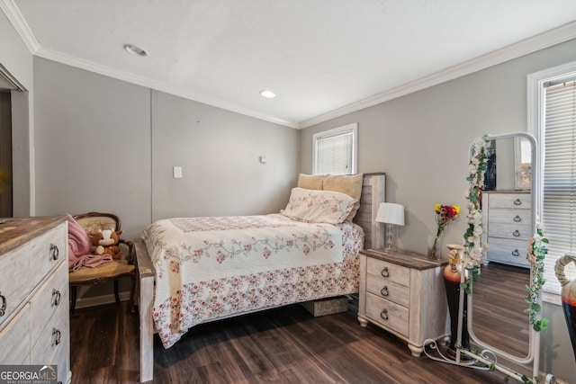 bedroom featuring dark hardwood / wood-style floors and ornamental molding