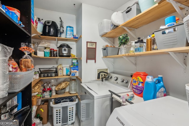 laundry area featuring washing machine and dryer