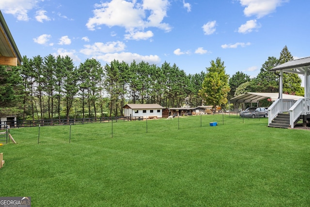 view of yard featuring a carport