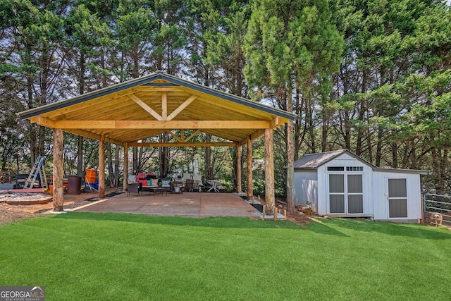 view of home's community featuring a patio area, a yard, a shed, and a gazebo