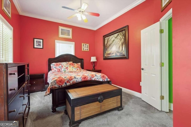 bedroom with carpet floors, baseboards, ornamental molding, and ceiling fan