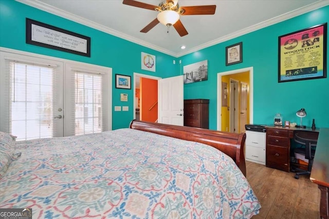 bedroom with wood finished floors, a ceiling fan, access to exterior, french doors, and crown molding