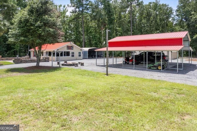 view of property's community featuring a yard