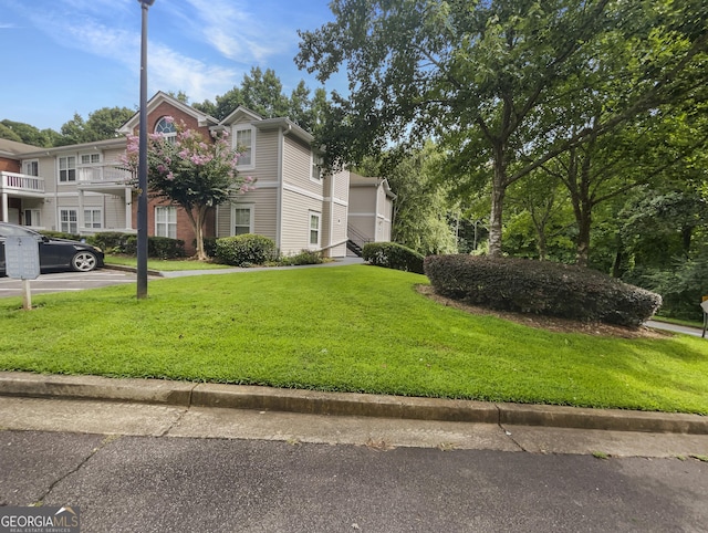 view of front of home with a front yard