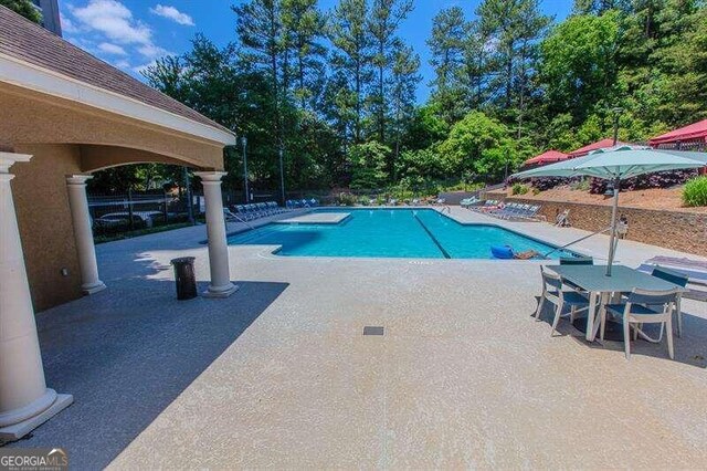 view of pool with a patio