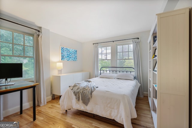 bedroom featuring light wood-type flooring