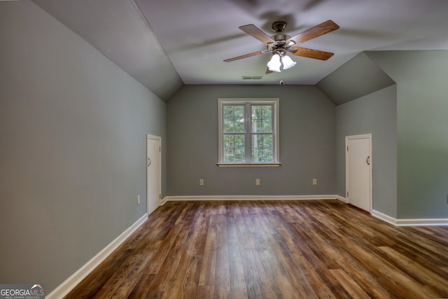 additional living space featuring hardwood / wood-style floors, ceiling fan, and vaulted ceiling