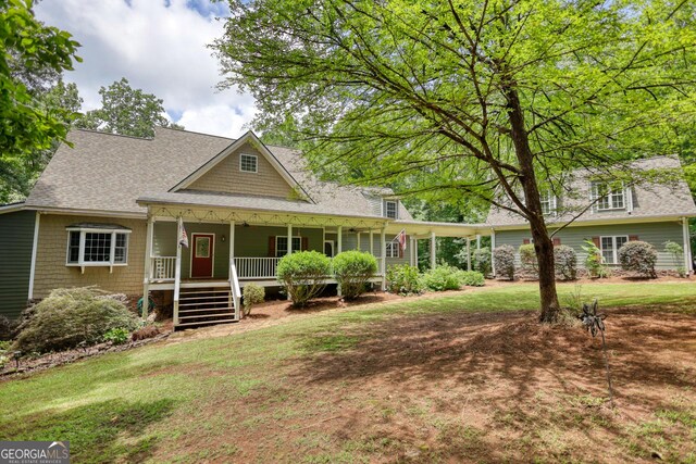 view of front of property featuring covered porch