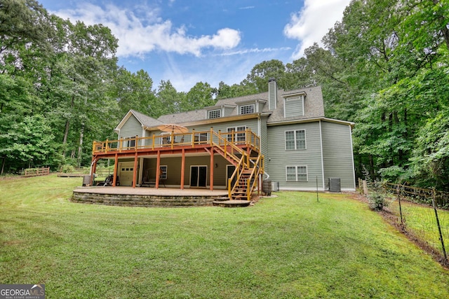 back of house with cooling unit, a wooden deck, a lawn, and a patio area