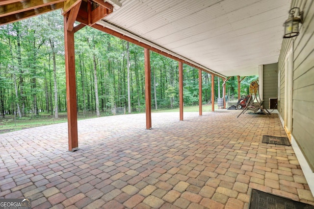 view of patio featuring fence