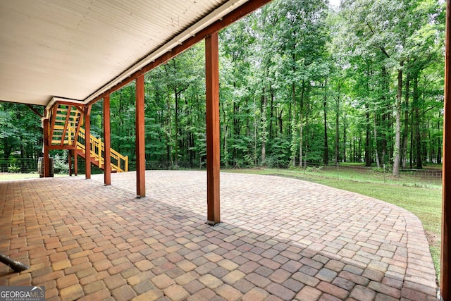 view of patio / terrace featuring stairway