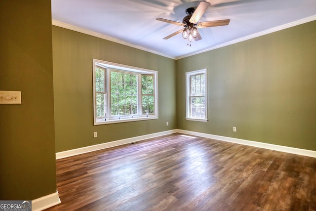 unfurnished room with ornamental molding, ceiling fan, and dark hardwood / wood-style floors