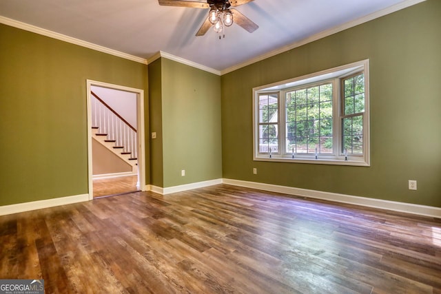 unfurnished room with hardwood / wood-style flooring, crown molding, and ceiling fan