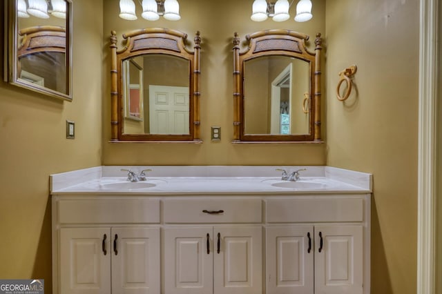 full bath featuring double vanity and a sink