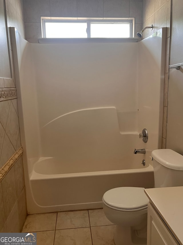 full bathroom with plenty of natural light, tub / shower combination, and toilet