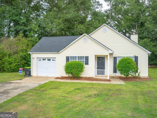 ranch-style house featuring a garage and a front lawn