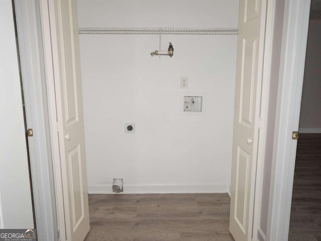 washroom featuring hookup for a washing machine, wood-type flooring, and electric dryer hookup