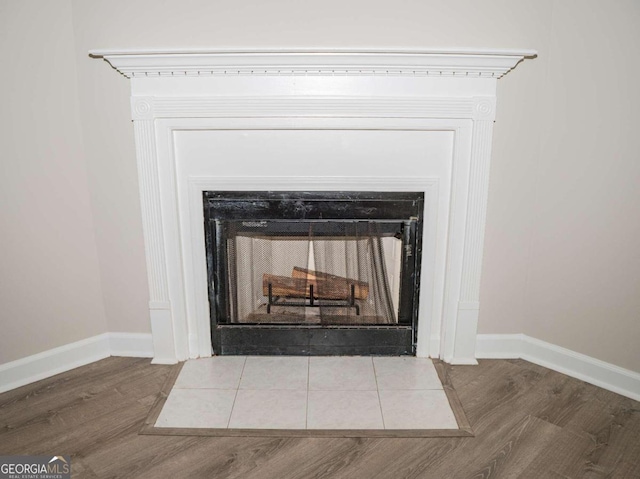15 Marissa Cv, Riverdale, GA 30274 - detailed view of a fireplace with flush hearth and wood finished floors