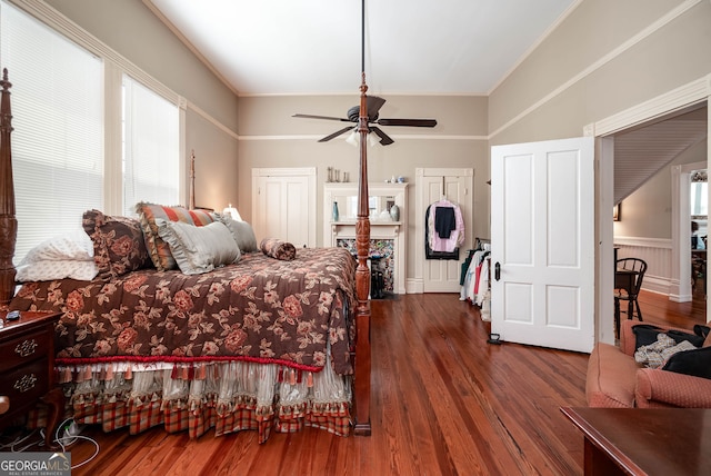 bedroom featuring hardwood / wood-style flooring and ceiling fan