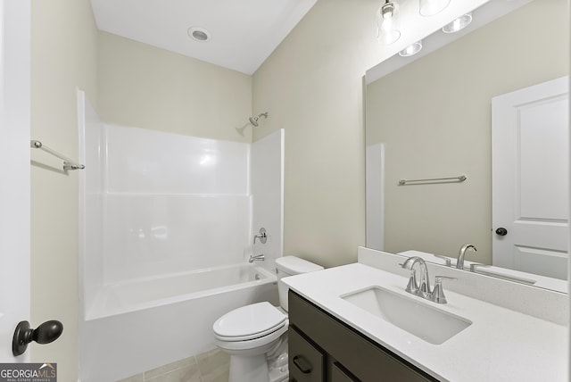 full bathroom with tile patterned flooring, vanity, tub / shower combination, and toilet