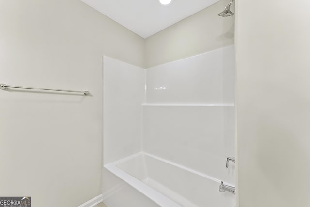 bathroom with shower / bathing tub combination