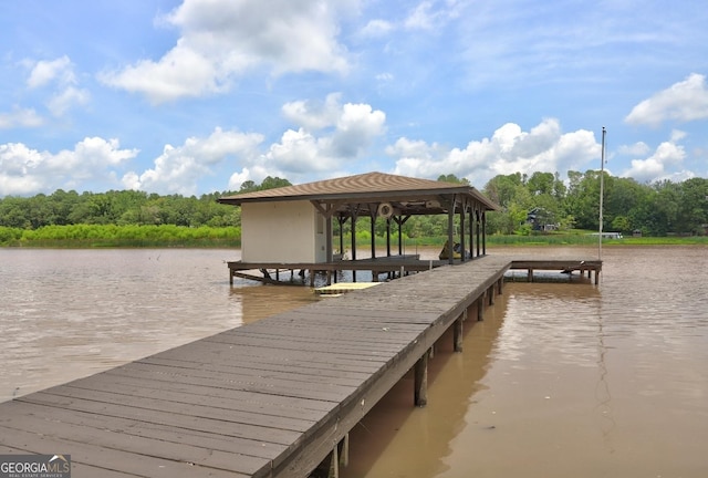 view of dock with a water view and boat lift