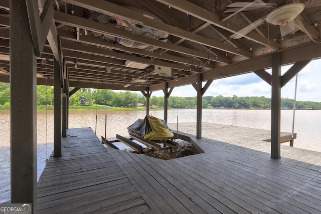 dock area featuring a water view and boat lift