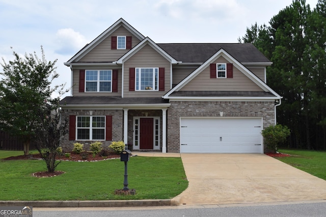 craftsman house with a garage and a front yard