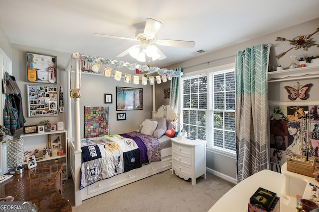 bedroom with multiple windows, carpet floors, and ceiling fan