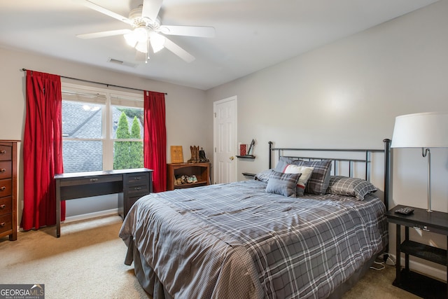 bedroom with ceiling fan and carpet flooring