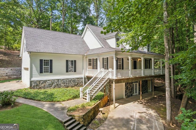 view of front of property featuring a carport and covered porch