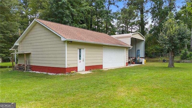 view of side of home with a yard