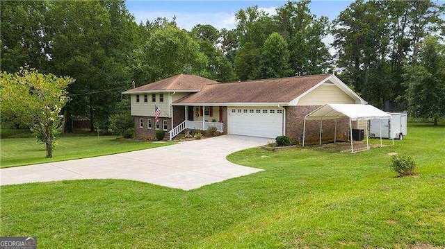 view of front of property featuring a garage and a front lawn