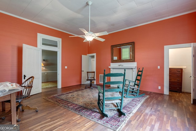 99 W Main St, Gibson, GA 30810 - dining area with wood finished floors, ornamental molding, and a ceiling fan